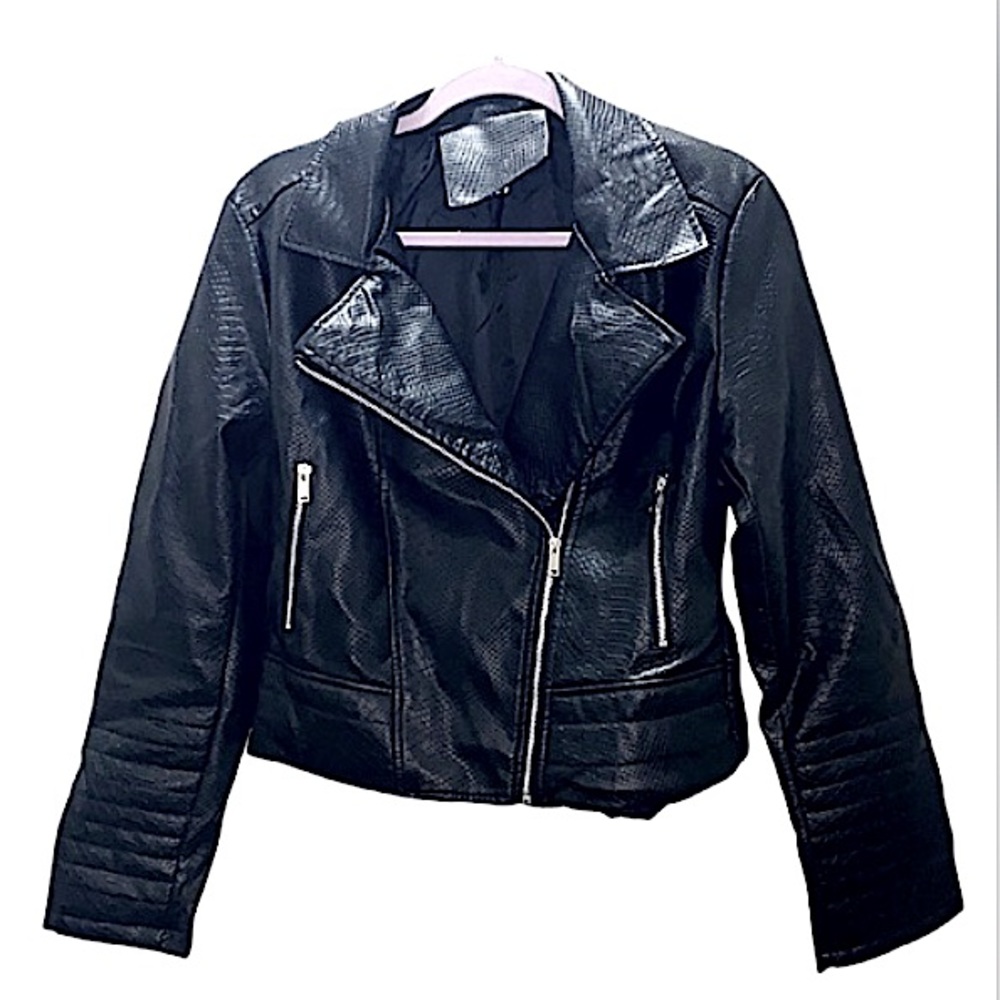 Super cute. Only worn once for a picture. Black moto leather jacket.